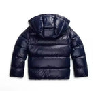 Flat lay back view of the navy puffer jacket showing quilted panelling across the shoulders and hood