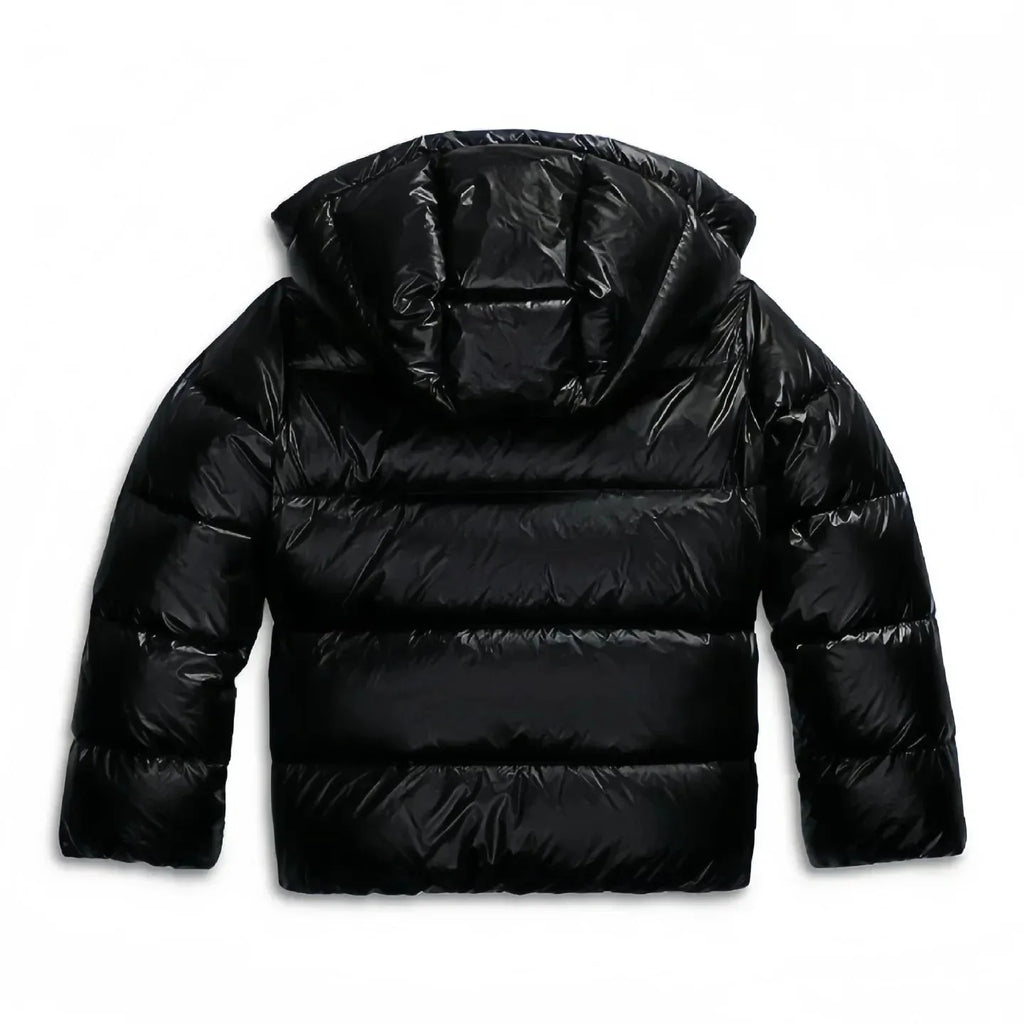 Flat lay back view of the black puffer jacket showing the structured hood and padded sleeves