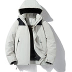 Full front view of black jacket laid flat, showing overall relaxed fit and hood shape