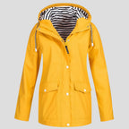 Bright yellow hooded rain jacket, front view, showing zip and popper fastening with striped inner lining