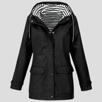 Black hooded rain jacket with drawstring hood and front patch pockets, worn look on mannequin form