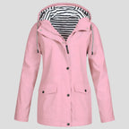 Pink hooded rain jacket with striped lining, drawcord hood and dark popper fastenings