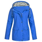 Bright blue hooded rain jacket, front view showing zip, popper placket and flap pockets