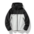 Black and white colour-block hooded jacket with full zip and taped seams, front laid flat
