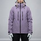 Front view of a lilac purple hooded ski jacket with black zip and twin chest pockets, worn over black ski trousers