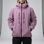 Front view of the jacket in dusty pink with hood up, chest pockets and centre zip clearly visible