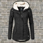 Black hooded winter coat with cream fleece lined hood, front zip and buttoned flap pockets
