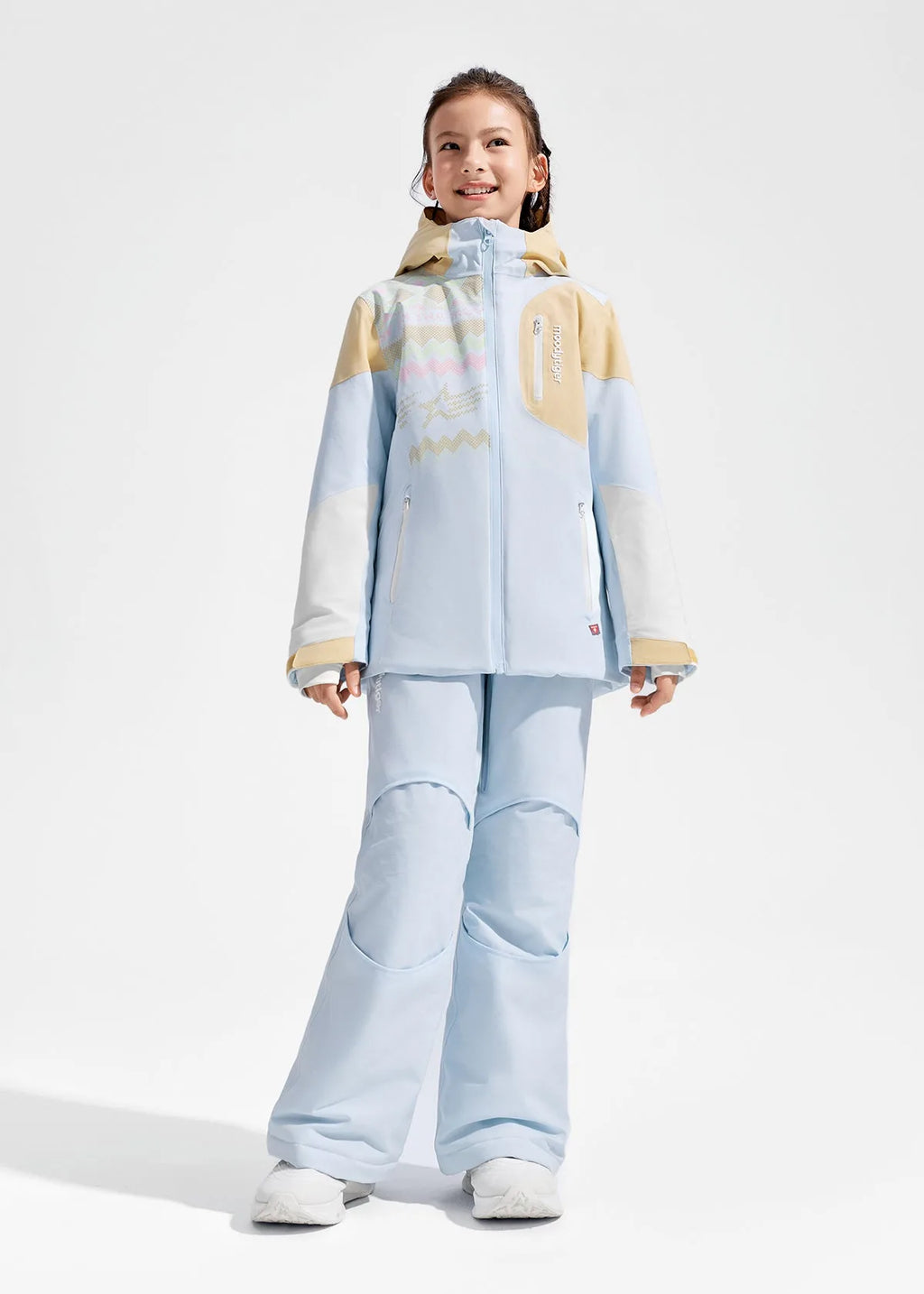 Close-up front view of pale blue and tan colour-block ski jacket with chest zip pocket and knitted-pattern graphic