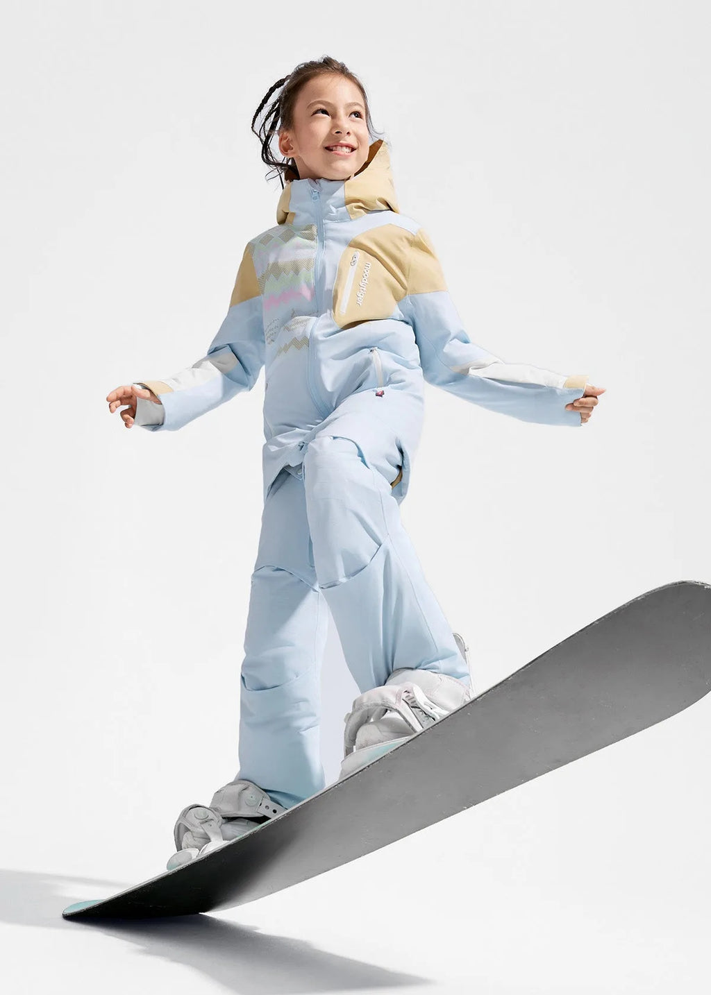 Full length view of pale blue ski jacket and matching trousers with tan shoulder panels and hood