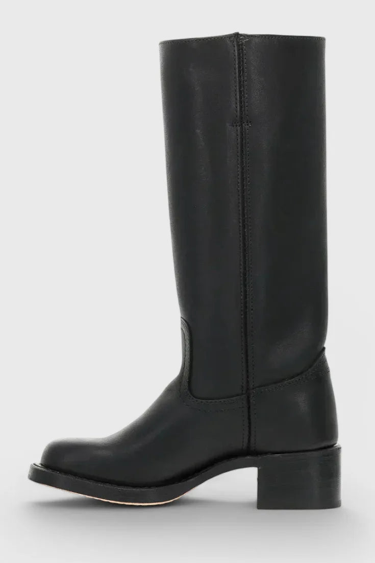 Pair of light brown leather knee-high boots photographed at a front angle on a white backdrop