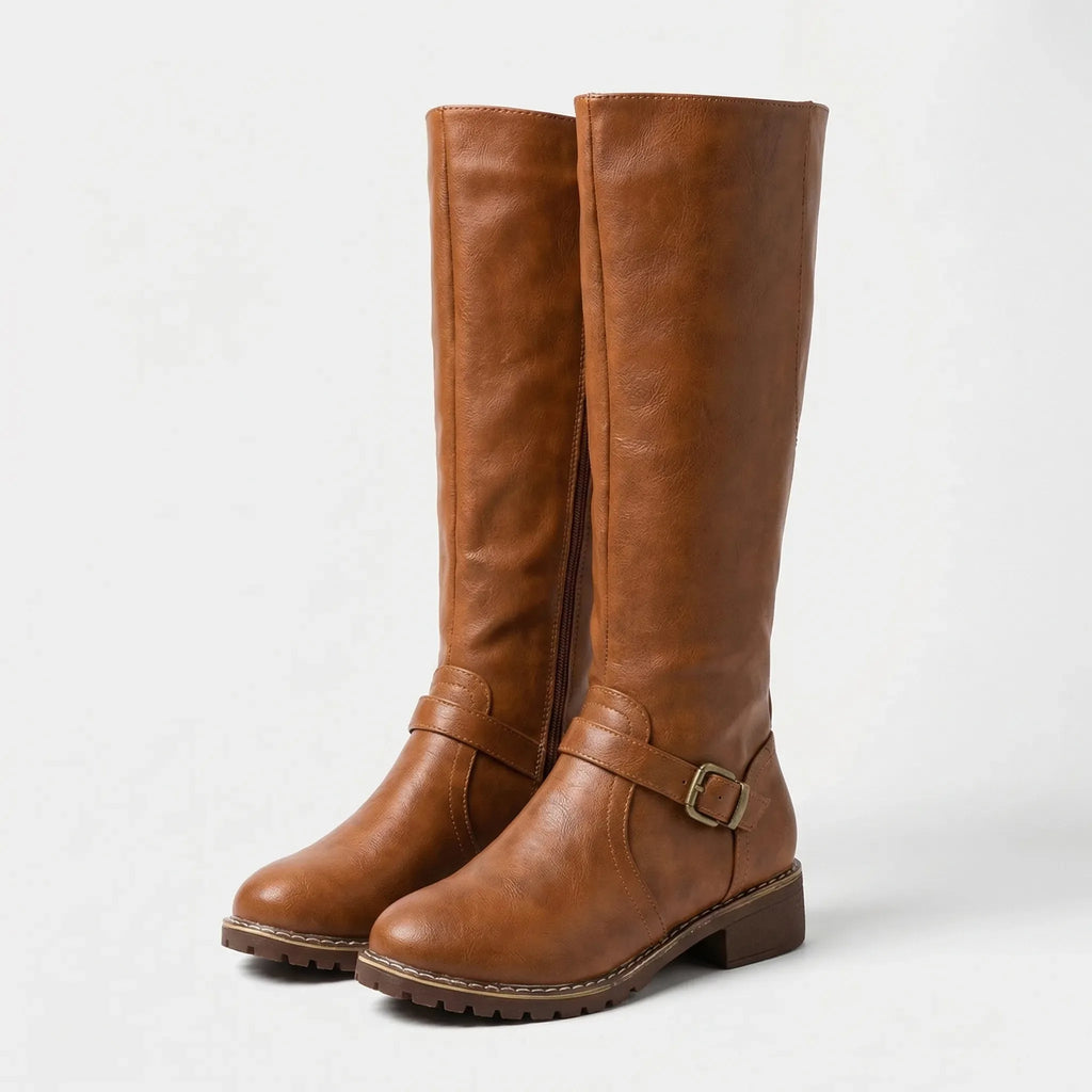 Pair of tan brown knee-high riding boots with buckle ankle strap and side zip, angled front view