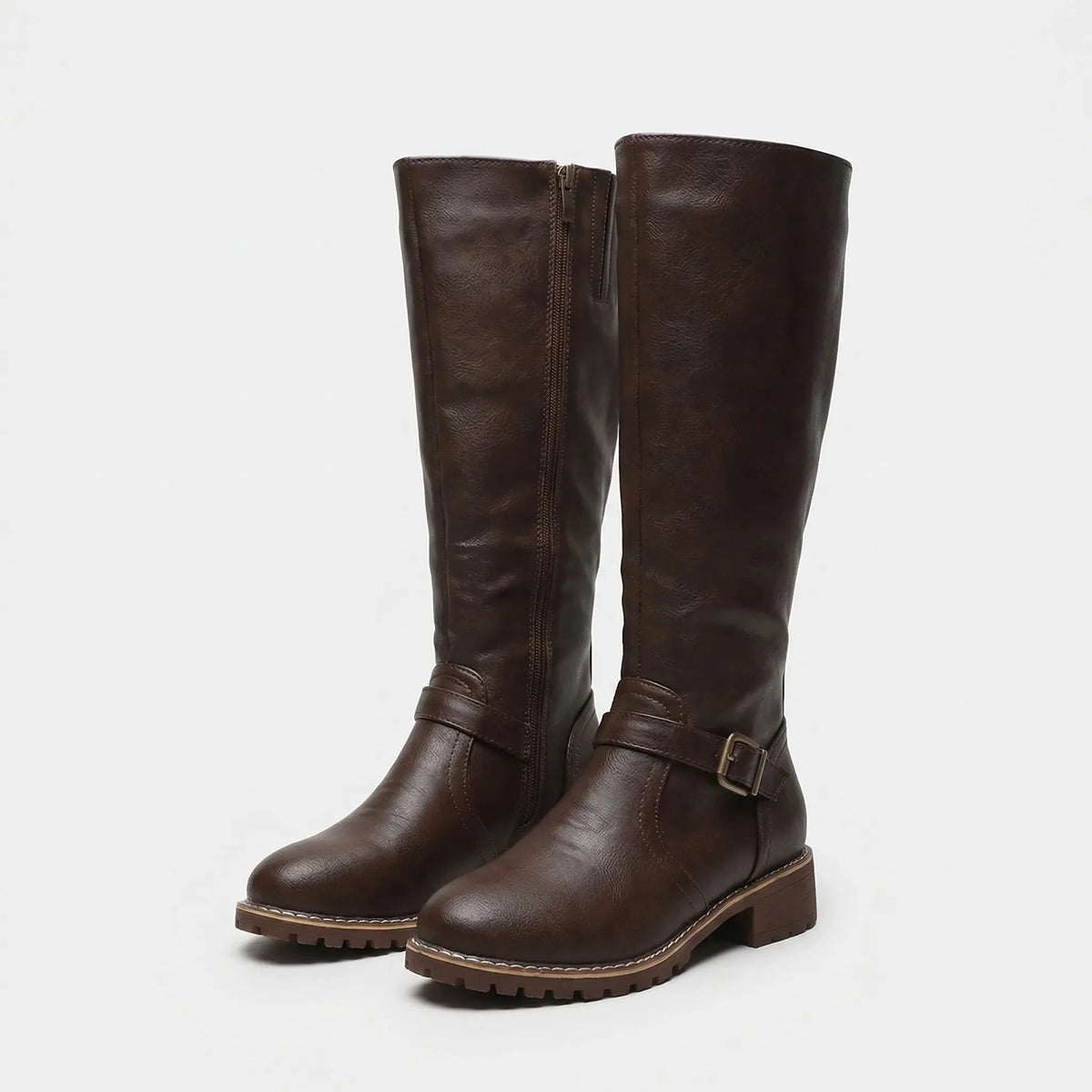 Dark brown knee-high leather-look riding boots showing buckle strap detail and ridged sole