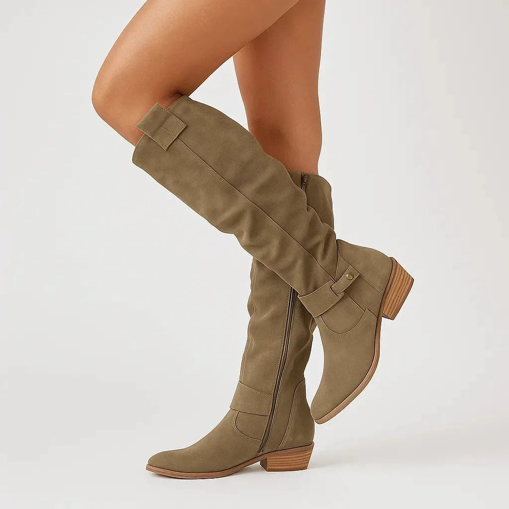 Olive green suede knee-high boots with slouchy shaft, zip closure and block heel, shown on model