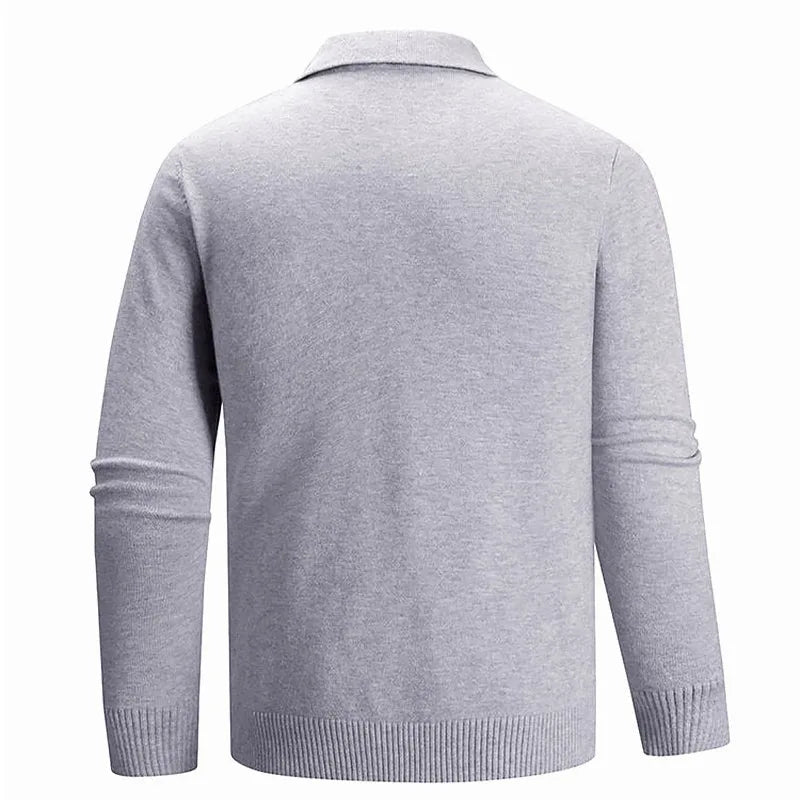 Back view of a light grey knitted polo jumper showing ribbed cuffs and collar seam