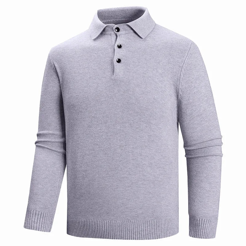 Flat lay style front shot of a light grey knitted polo jumper laid out showing full collar and button detail