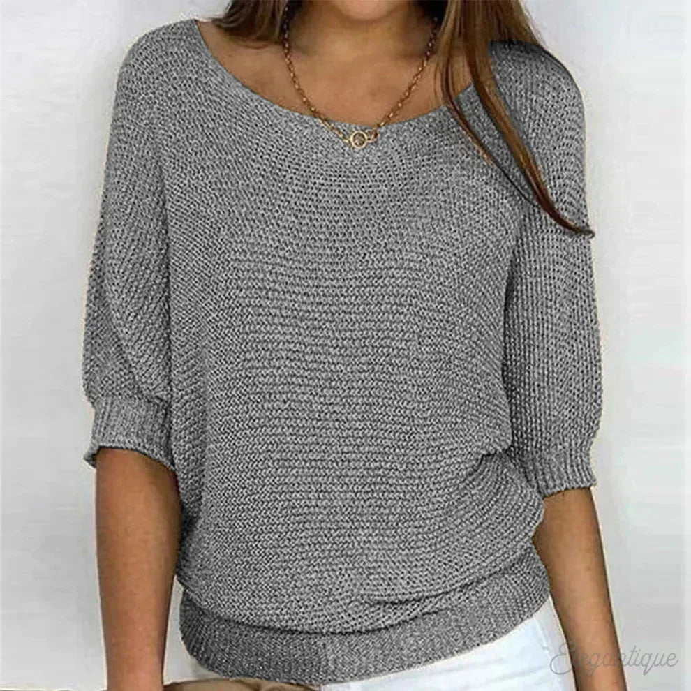 Grey marl knit jumper with ribbed cuffs and relaxed batwing silhouette