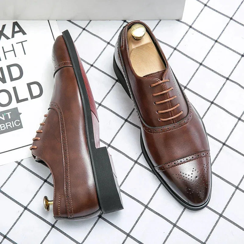 Angled view of brown leather brogue oxford shoes with wooden shoe trees, showing the stitched sole and heel construction