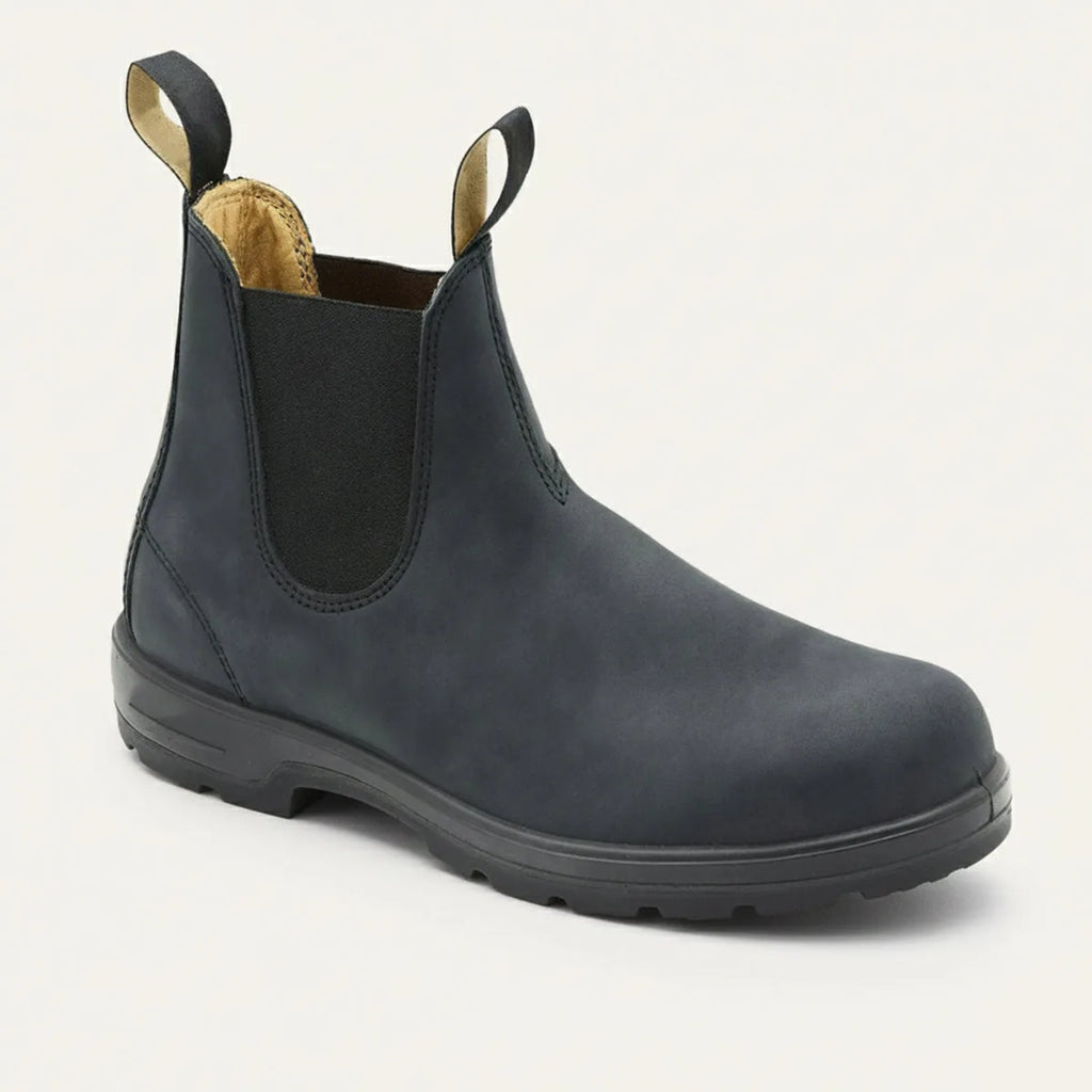 Three-quarter view of a matte black leather Chelsea boot with round toe and black sole