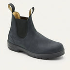 Three-quarter view of a matte black leather Chelsea boot with round toe and black sole