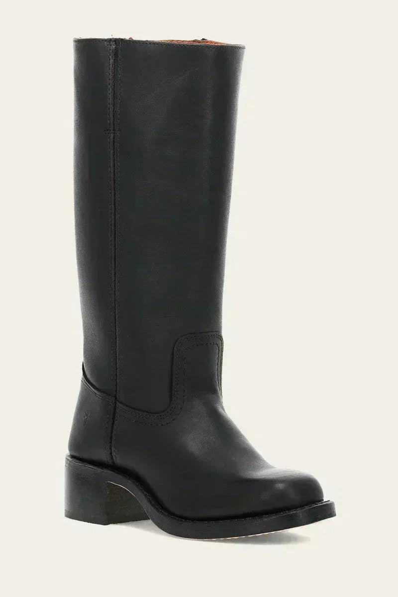 Close-up of the rounded toe and top-stitching detail on a black leather boot