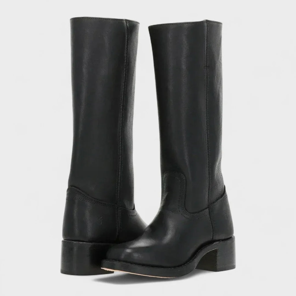 Pair of knee-high black leather campus boots shown at an angle, highlighting the stitched seam detail and block heel