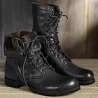 Black leather lace-up boots with a folded cuff lined in checked fabric and a low block heel