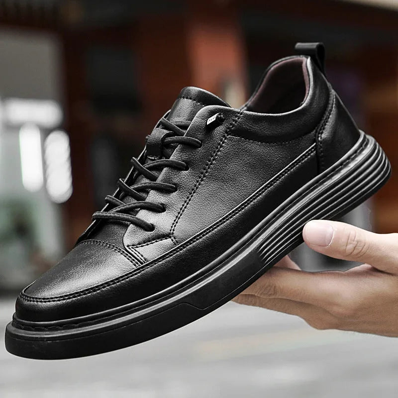 Pair of brown leather trainers on foot, highlighting the thick ridged sole and heel tab
