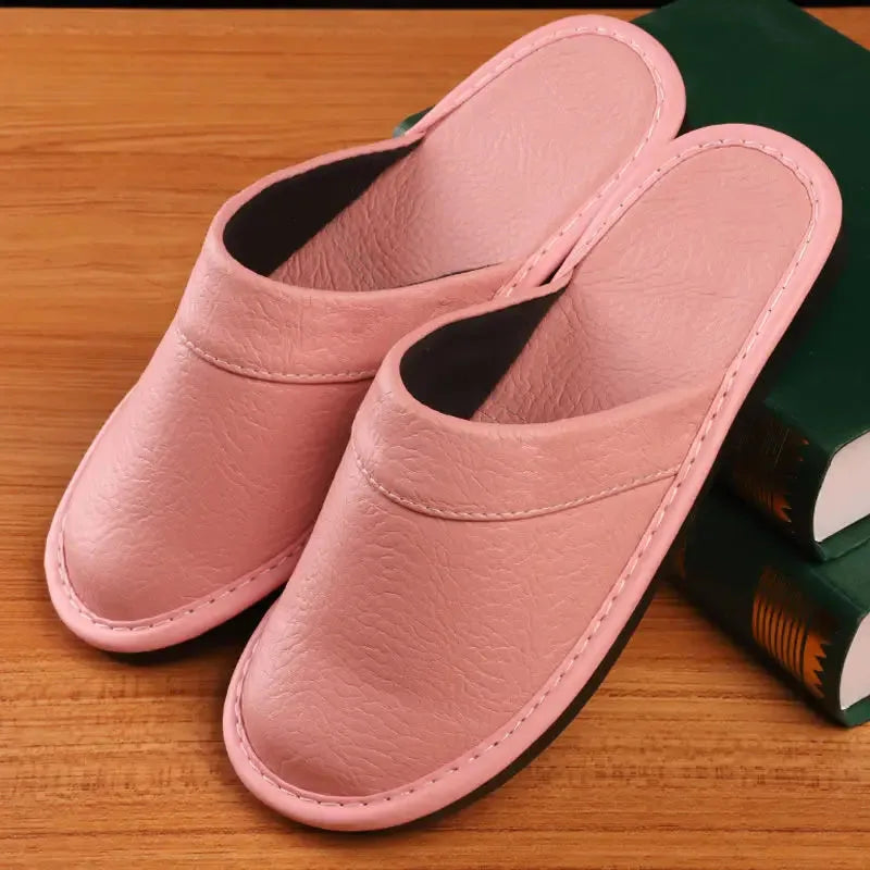 Close-up of the soft suede-like inner lining visible inside a brown leather slipper