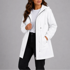 White hooded rain coat shown fully open, revealing the full zip closure and adjustable hood toggles.