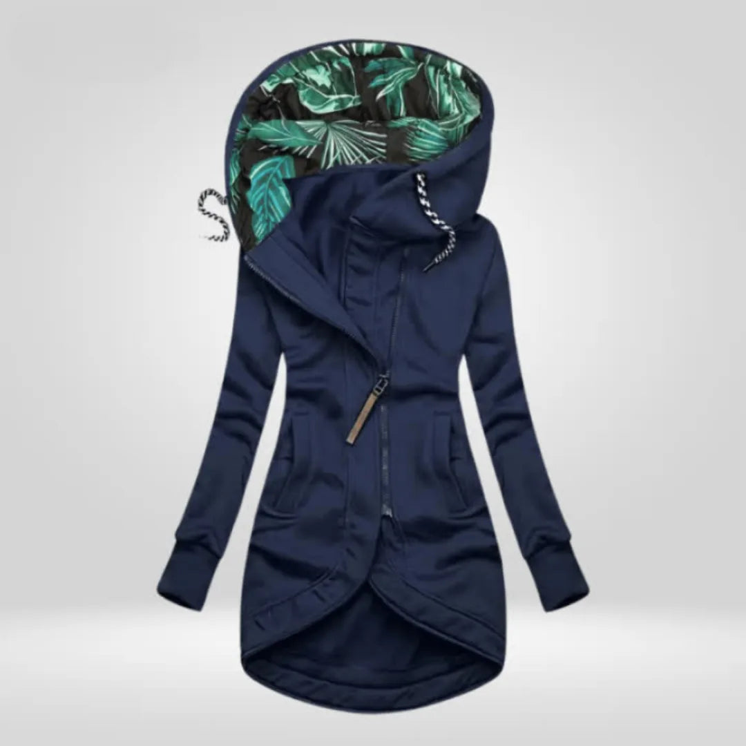Navy blue longline hooded coat with tropical leaf print lining and contrast drawstrings