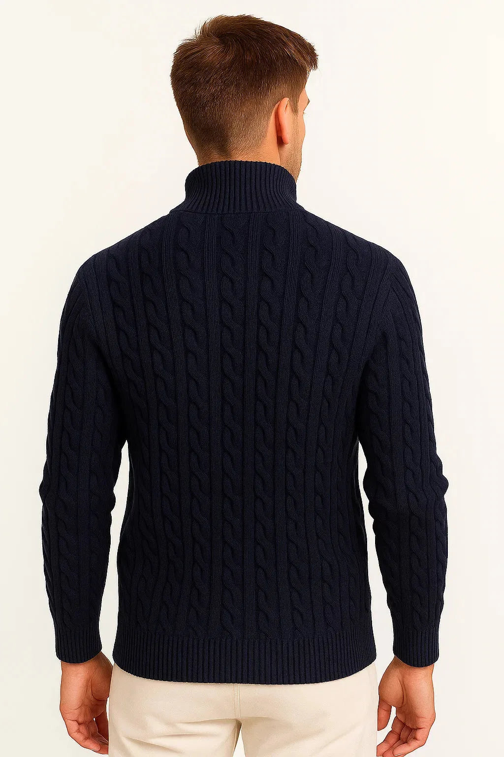 Back view of a navy cable-knit jumper showing the ribbed standing collar and knit texture