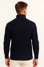Back view of a navy cable-knit jumper showing the ribbed standing collar and knit texture