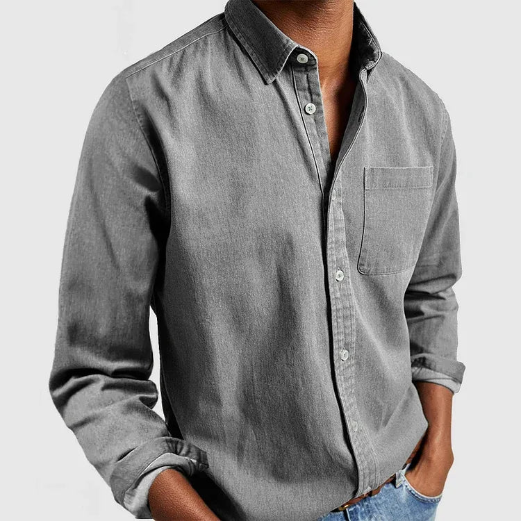 Grey long sleeve shirt shown from the front, highlighting the soft collar and chest pocket detail