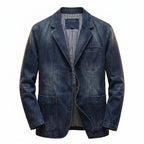 Dark denim blazer on a wooden hanger, front view with distressed detailing and visible wash fading on the sleeves