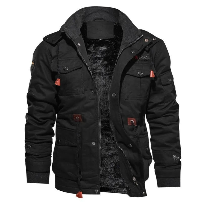 Black cargo-style jacket laid flat, unzipped, showing the soft fleece lining and stand-up collar