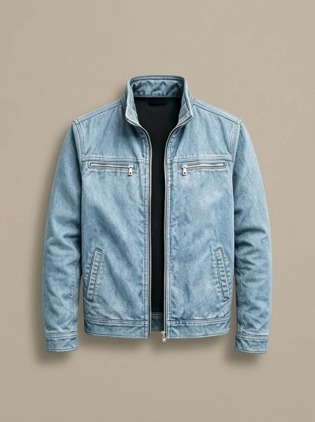 Light blue washed denim jacket laid flat, unzipped, showing stand collar and silver zip pulls