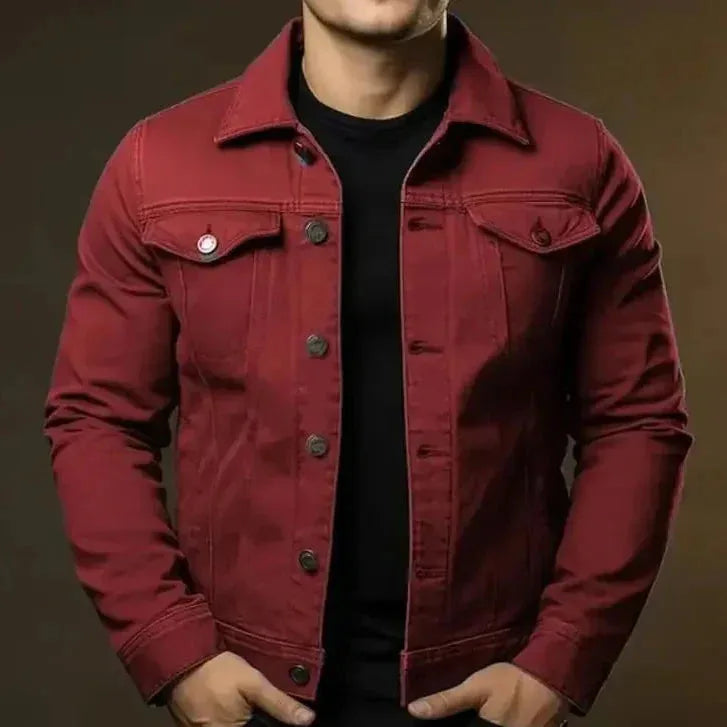 Red denim trucker jacket worn open, showing chest pockets and button placket detail