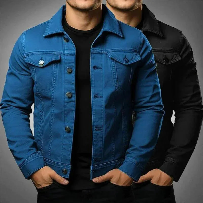 Blue denim trucker jacket against a light grey background, front view highlighting fit and stitching