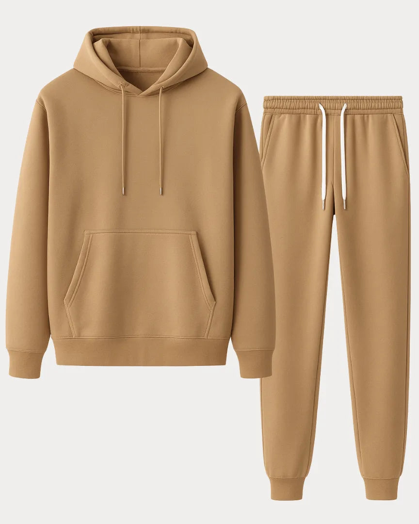 Flat lay of a khaki hooded sweatshirt and matching jogger tracksuit on a plain background