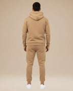 Back view of the khaki hooded tracksuit showing the hood and relaxed fit
