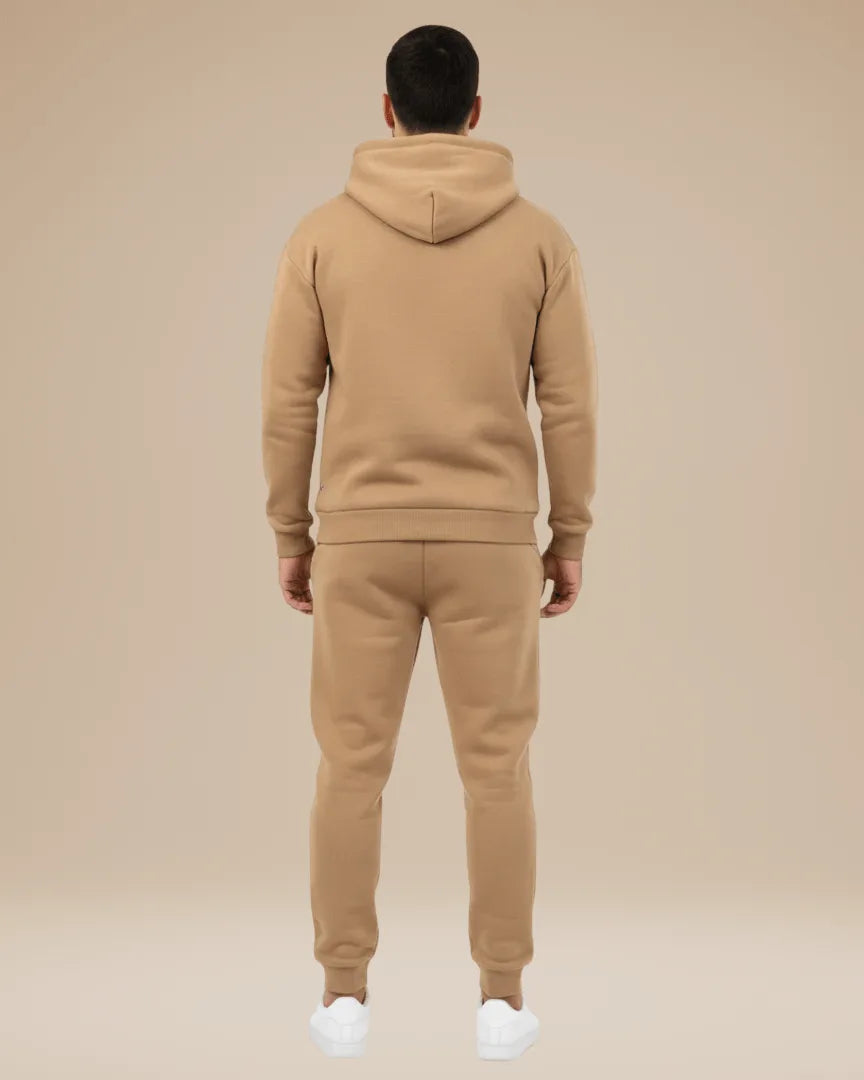 Back view of the khaki hooded tracksuit showing the hood and relaxed fit