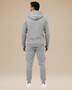 Close-up front view of the khaki hoodie showing the drawstring hood and kangaroo pocket