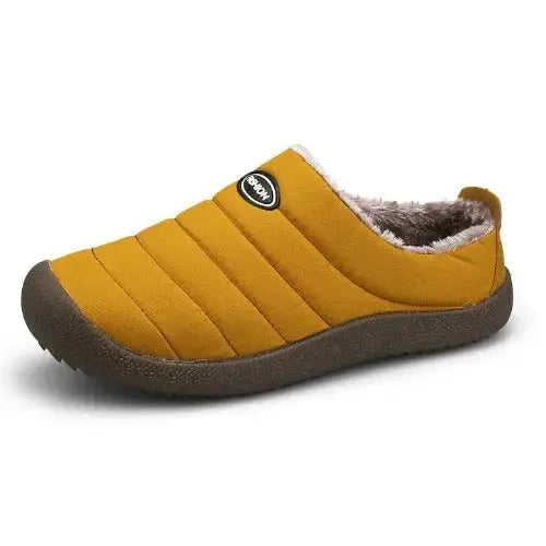 Top-down view of navy slippers showing the fluffy grey interior lining and collar