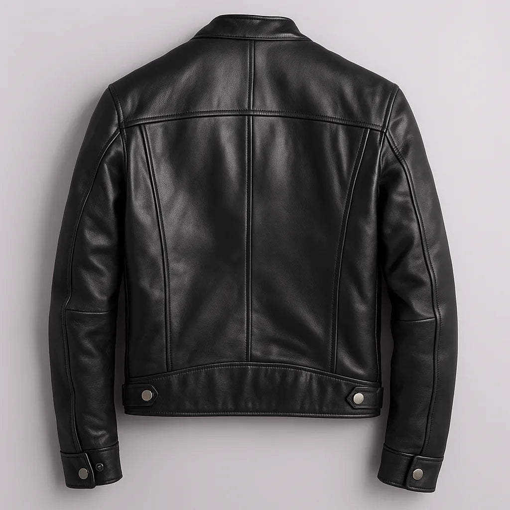 Black leather biker jacket, back view showing panel seams, waist tabs and tailored shoulder shaping