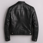 Black leather biker jacket, back view showing panel seams, waist tabs and tailored shoulder shaping