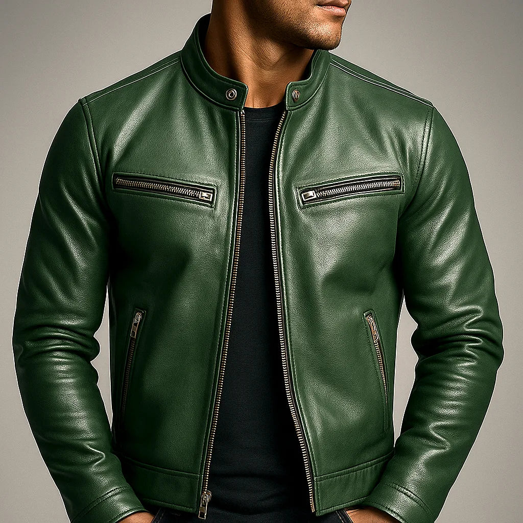 Close-up of green leather biker jacket worn by a model, showing collar, chest pocket and sleeve seam detail