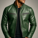 Close-up of green leather biker jacket worn by a model, showing collar, chest pocket and sleeve seam detail