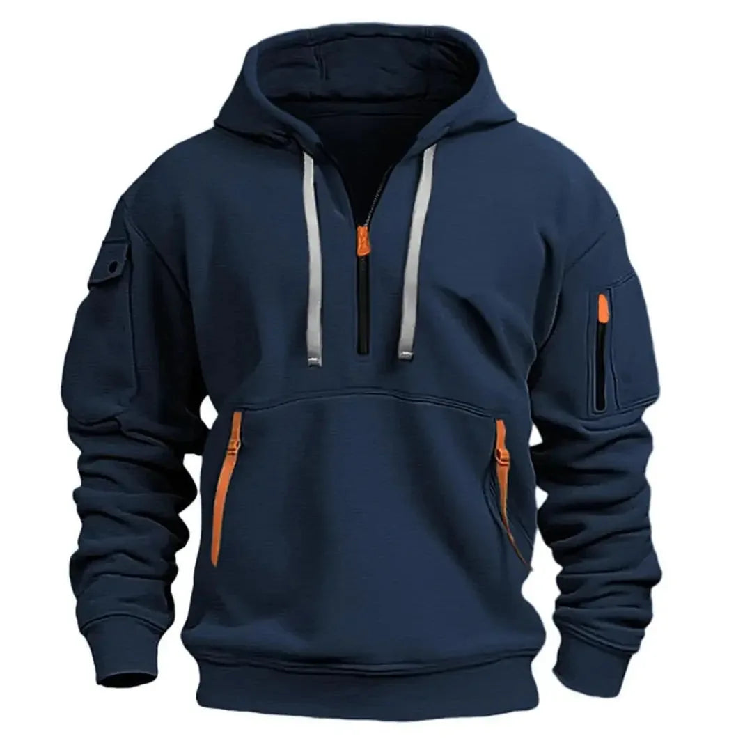 Navy blue quarter-zip hoodie with grey drawstrings, chest pouch pocket and orange-trimmed zip pockets, front view