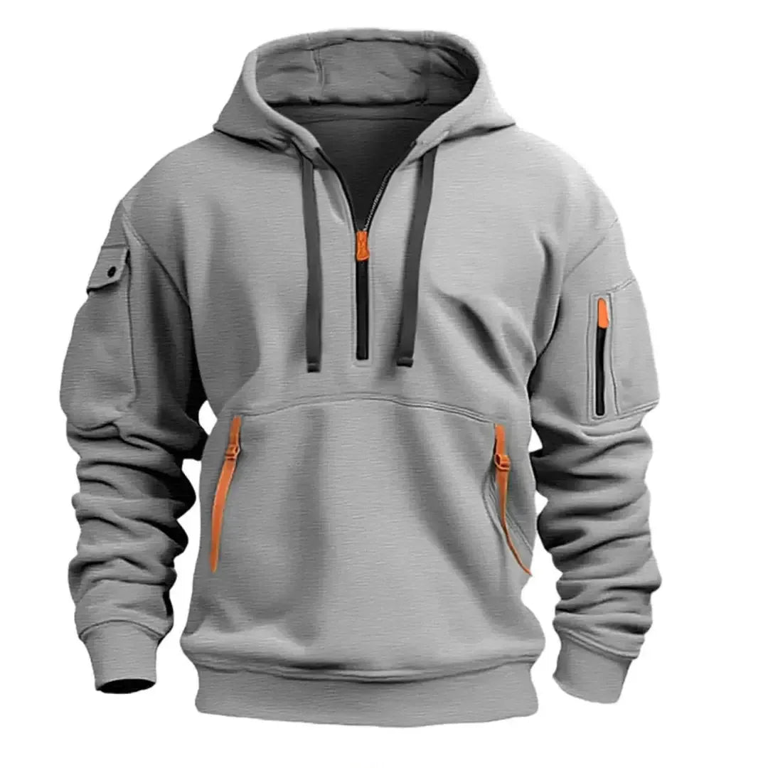 Light grey hooded sweatshirt with half-zip collar, arm cargo pocket and orange zip pulls on front pockets