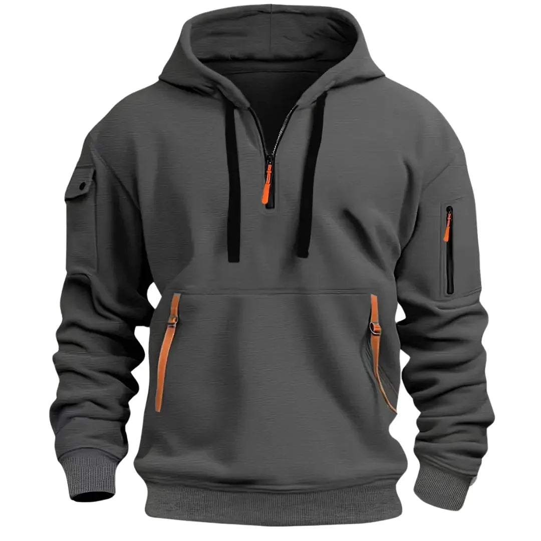 Dark grey marled hoodie with black drawcords, tan-trimmed zip pulls and front zippered pouch pocket